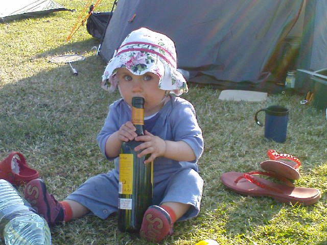 Carla with an (empty) wine bottle